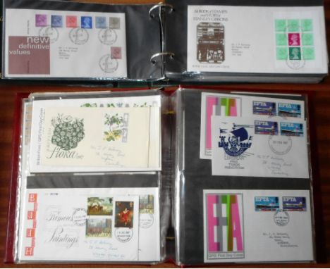 Stamps. Four albums of First Day Covers.