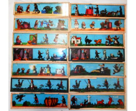 Glass magic lantern slides. Two boxes of German made slides, 130mm x 35mm. Appear unused. Also twelve others, 215mm x 57mm.