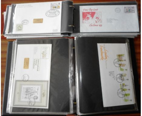 Stamps. Four albums of First Day Covers.