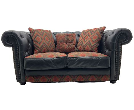 Barker and Stonehouse - chesterfield two seat sofa, upholstered in buttoned black leather and red and green geometric pattern