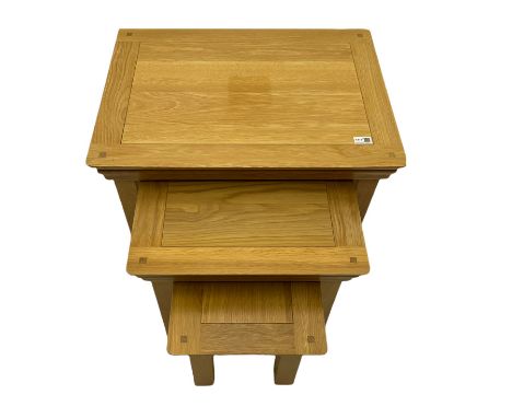 Light oak nest of three tablesDimensions: Height:&nbsp;51cm&nbsp; Length/Width:&nbsp;68cm&nbsp; Depth/Diameter:&nbsp;50cm