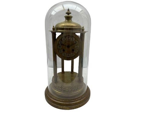 A French gilt brass Rotunda mantle clock with an eight-day enclosed countwheel striking movement striking the hours and half 