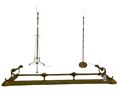 Early 20th century Art Nouveau brass standard lamp, telescopic column, late 19th century brass fire fender with scrolled supp