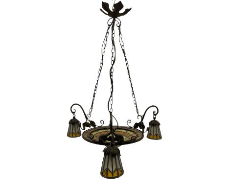Art Nouveau style wrought metal ceiling light fitting, dome leaded glass central shade, three scroll branches decorated with 