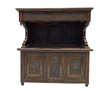 Early 20th century oak buffet side cabinet, the raised back with moulded top over two drawers, three panel back and two cupbo