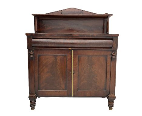 Early 19th century mahogany chiffonier side cabinet, the raised arched back with open shelf over cushion frieze drawer and tw