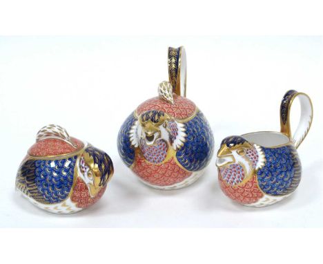 A Royal Crown Derby Porcelain 'Quail' Imari Pattern Teapot and Cover, Sucrier and Cover and a Milk Jug, date codes for 1986-1