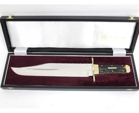 A Stan Shaw Bowie Knife, with stag scales, nickel silver engraved bolsters, workback to handle and back of blade, overall len