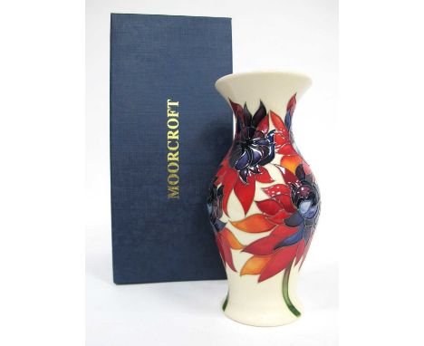 A Moorcroft Pottery Vase, of baluster form, painted in the 'Ruby Red' pattern, impressed and painted marks, signed by Emma Bo