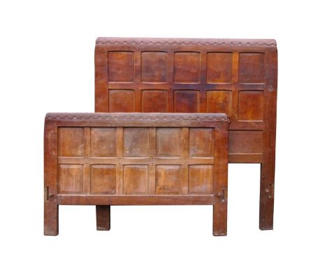 A 1930's Robert 'Mouseman' Thompson Oak Single Bed, headboard and foot both with arcaded top rails, adzed panels, carved mous