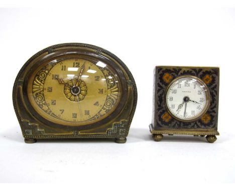 A Zenith Gilt Metal and Enamel Travelling Clock, decorated with flower heads, bun feet, 6cm high; An Art Deco Brass Cased Ala