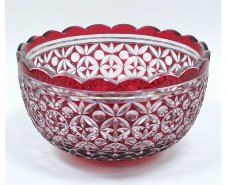 A Mid XX Century Ruby Flashed Punch Bowl, cut with a geometric design, fluted rim on circular foot, 29.5cm diameter.