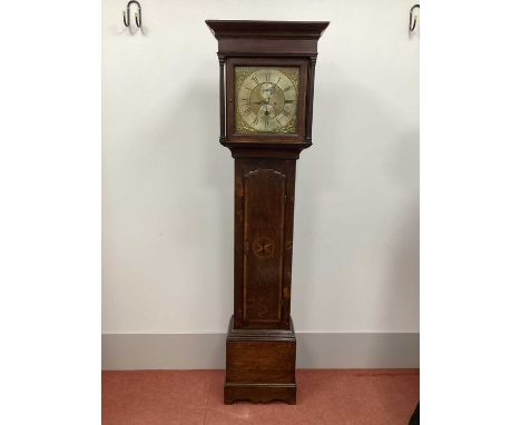 An XVIII Century Oak Eight-Day Longcase Clock, with stepped pediment and square door with column supports to the brass dial i
