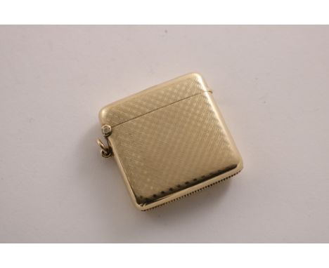 AN EDWARDIAN 9 CT. GOLD VESTA CASE with engine-turned, hatched decoration, by the Goldsmiths &amp; Silversmiths Co.Ltd., Lond
