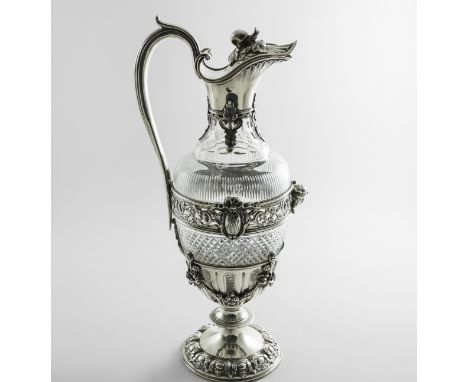 A LATE 19TH CENTURY FRENCH MOUNTED CUT-GLASS CLARET JUG of classical vase form with pierced and embossed borders, applied flo