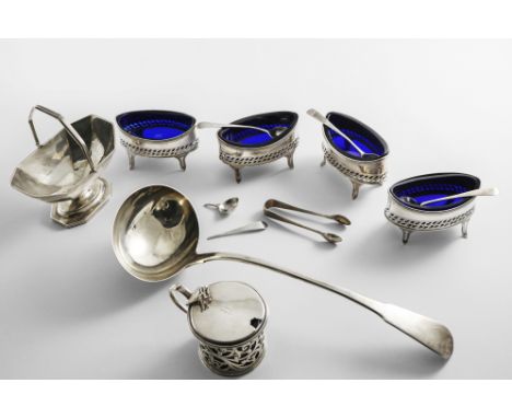 A MIXED LOT:- A set of four George III navette-shaped salts with pierced and pricked borders and blue glass liners, together 