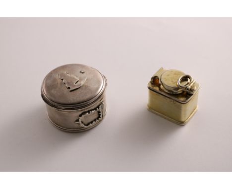 A GEORGE III SILVER BOUGIE BOX circular with reeded borders and a folding handle, maker's mark &amp; lion passant only (struc