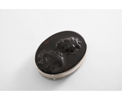 A GEORGE III OVAL SNUFF BOX with a tortoiseshell base, the cover inset with a pressed tortoiseshell plaque, with a portrait o