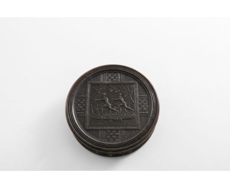 CYCLING INTEREST:- An early 19th century circular pressed horn snuff box, the pull-off lid pressed with two cyclists on early