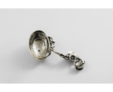 A VICTORIAN SCOTTISH CAST NATURALISTIC CADDY SPOON with a bowl resembling a shell and a curved tendril stem with applied wate