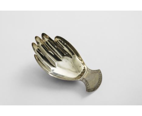 A GEORGE III CADDY SPOON in the form of a right hand with a border-engraved lug handle, by Josiah Snatt, London 1810;  2.75" 