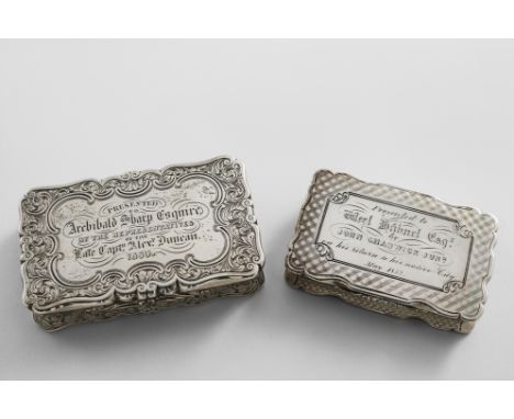 A VICTORIAN SILVER ENGRAVED SNUFF BOX of shaped rectangular outline, inscribed on the cover "Presented to Archibald Sharp Esq