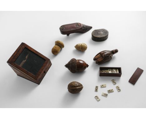 A MIXED LOT:- A Victorian Kingwood-veneered watch holder with a glazed, sloping front, a carved wooden thimble case in the fo