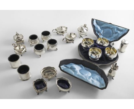 CONDIMENTS:- Five various small mustard pots, four salts (all with blue glass liners), a single salt, two pepperettes, a set 