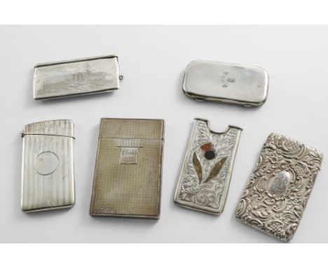 AN ASSORTMENT OF SMALL SILVER CARD CASES:- An Edwardian "Scottish market" example with inset agate pieces and engraving, a Ca