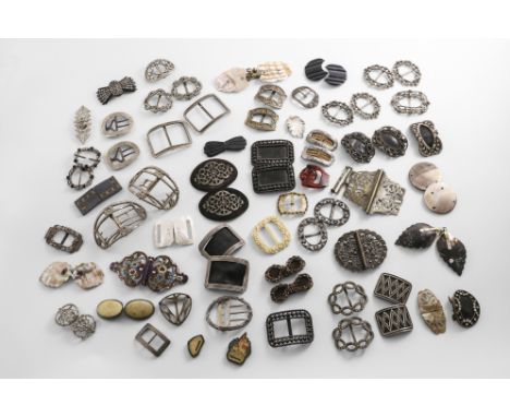 A QUANTITY OF ASSORTED BUCKLES in a variety of non-precious materials (mother of pearl, plastic, plated ware, gilt-metal, pas