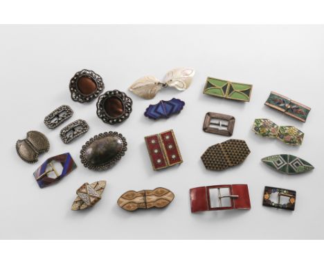 THIRTEEN SMALL ART DECO ENAMELLED BUCKLES two pairs of paste-set buckles, a brass &amp; black painted buckle, a carved mother