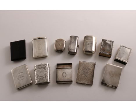 AN AMERICAN SILVER BOOK MATCH HOLDER with a hammered finish, c.1925, another with engraving &amp; script initials, a tortoise