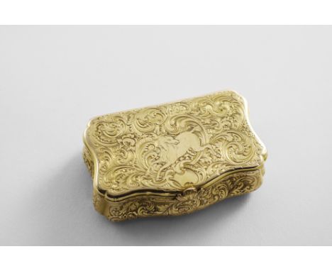 A MID 19TH CENTURY RUSSIAN GOLD SNUFF BOX (56 ZOLOTNIKS) of cartouche outline, profusely engraved all over with floral scroll