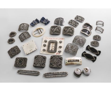 TWELVE PAIRS OF 19TH CENTURY CUT-STEEL BUCKLES A gun-metal buckle, a pair of steel buckles, an agate buckle, a cut-steel buck