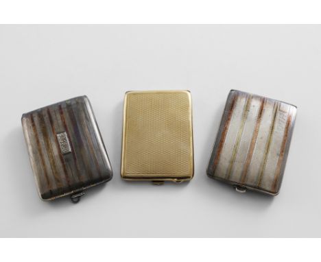 AN EARLY 20TH CENTURY 9 CT. GOLD BOOK MATCH HOLDER with engine-turning by S.J. Rose, London 1925, an American silver bookmatc