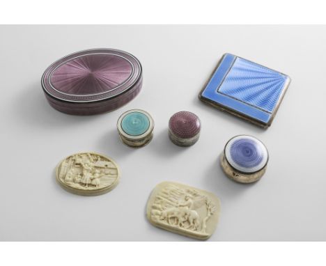 FIVE ENAMELLED BOXES:- A Continental oval example with mauve enamel over an engine-turned ground and a pull-off cover, import