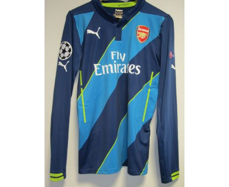 MATCH WORN SHIRT / LAURENT KOSCIELNY ARSENAL       Dark and light blue stripe Champions League shirt worn in 2014/15 season. 