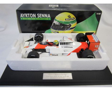 F1 MODEL CARS - AYRTON SENNA        Issued by Minichamps Lang, a 1:18 scale F! McLaren Honda MP4-4 1988 First World Champions