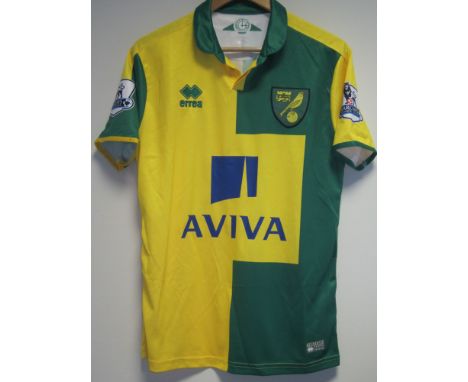 MATCH WORN SHIRT / GRAHAM DORRANS / NORWICH CITY       Yellow and green short sleeve shirt from season 2015/16 worn v. Arsena