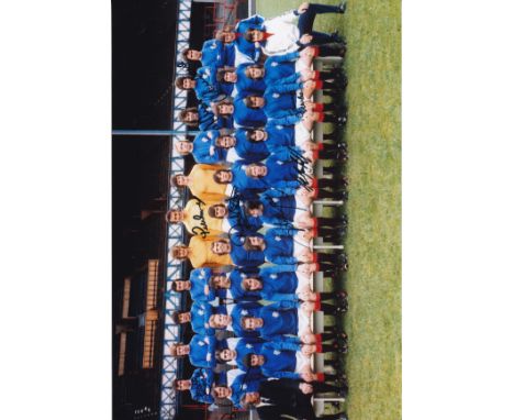 RANGERS       Col 12” x 8” photo, showing an image of Rangers entire playing staff, circa mid 1970s, nicely signed by 9 playe