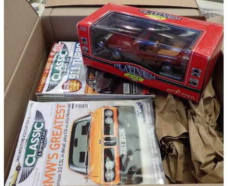 Twenty seven classic and sports car magazines, 2008 onwards and a 1/18 scale platinum Mercedes 500sl model. Not available for