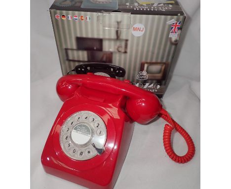 Red 1960/1970s style Rotary telephone, compatible with modern telephone banking and any standard analogue landline, boxed. P&