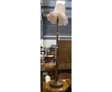 Wooden turned standard lamp, H: 200 cm. All electrical items in this lot have been PAT tested for safety and have passed. Thi