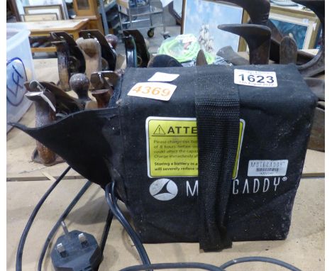 Moto caddy golf buggy, battery and charger. All electrical items in this lot have been PAT tested for safety and have passed.