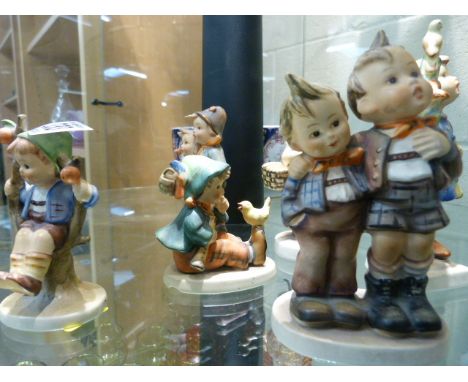 Six Hummel figures