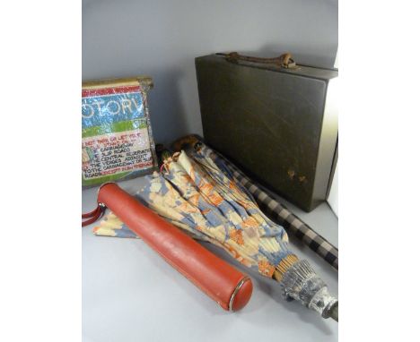 A Vintage tin and three various umbrellas