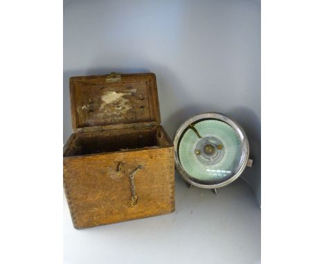 A Pigeon Racing clock in oak case