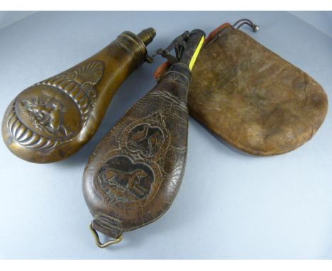 A copper powder flask with a leather shot flask both with hunting scenes