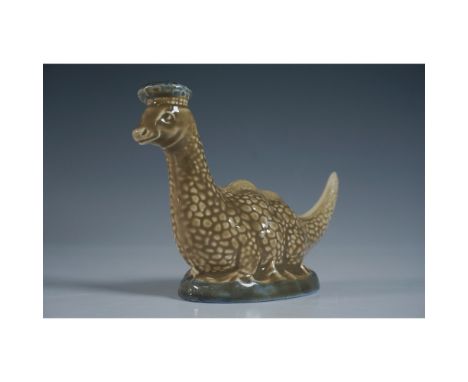 A charming Beswick ceramic decanter in the form of the Loch Ness Monster, designed to contain Beneagles Scotch Whisky. Modele