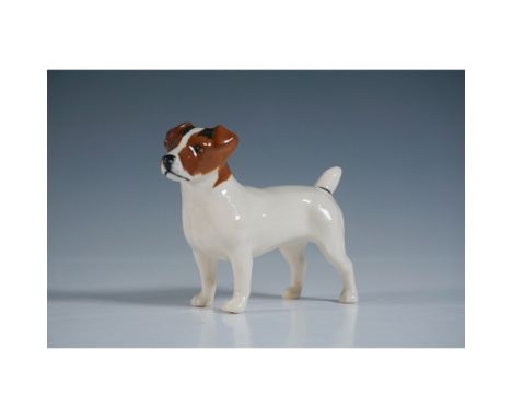 Charming John Beswick ceramic figurine depicting a Jack Russell Terrier, crafted in fine detail with a glossy finish. The fig